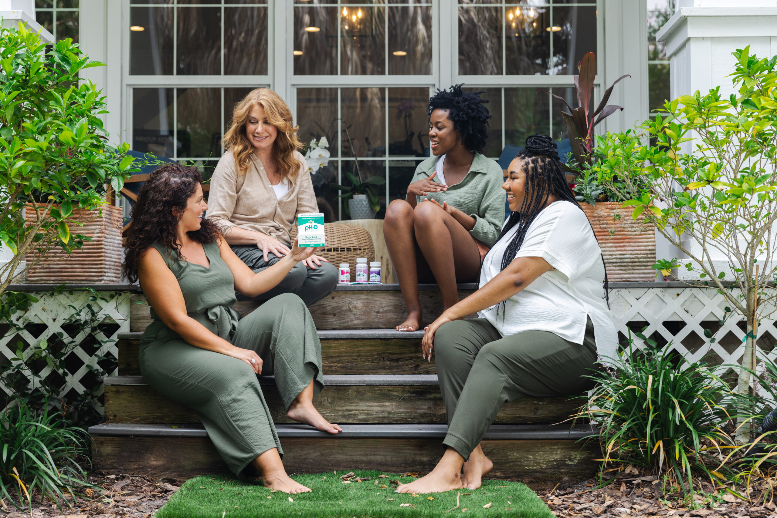 women sitting outside talking with health supplements